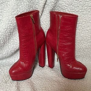 Shoedazzle’s maroon red, size 6, snake skin high heels